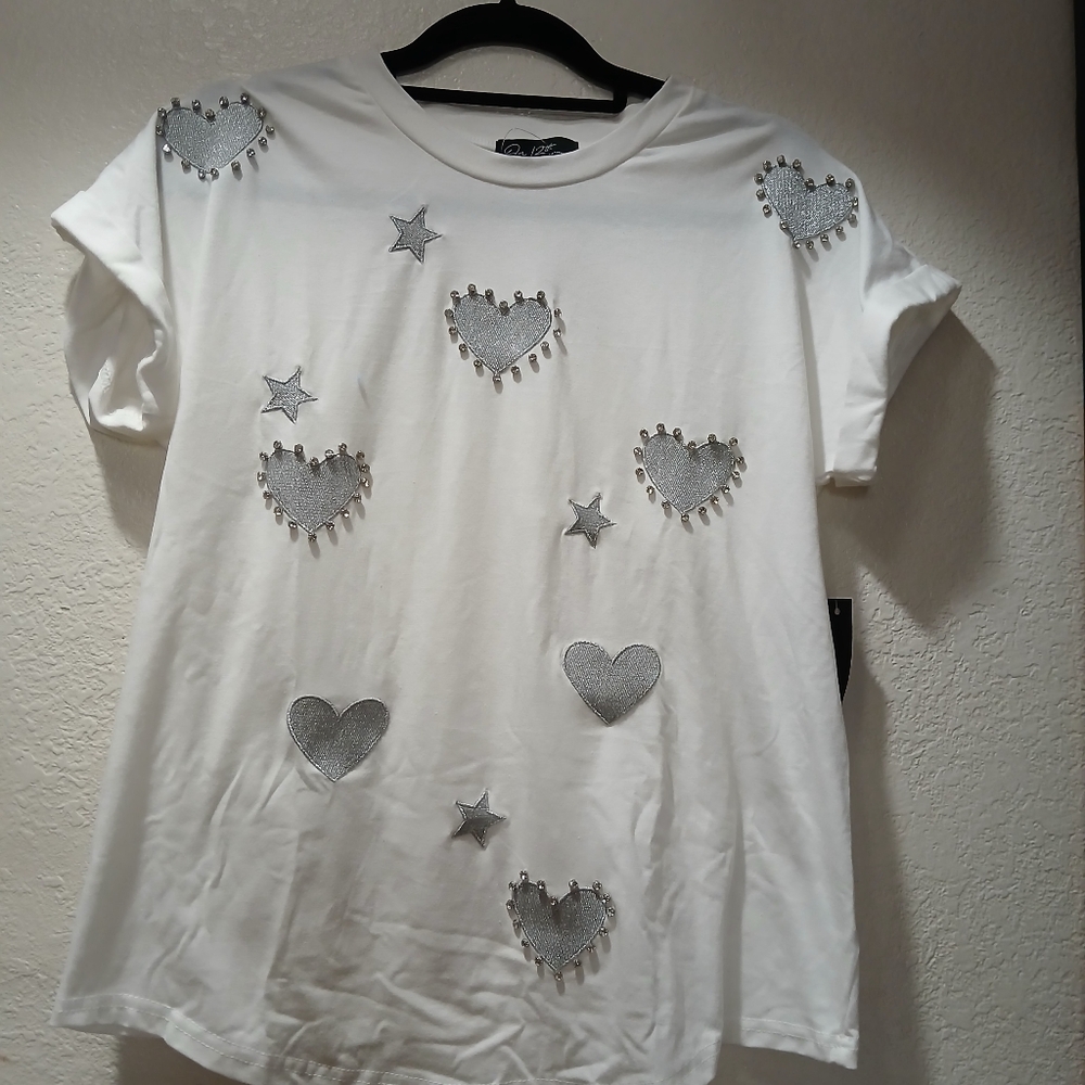 on 12 th maternity White top with Silver Heart and Star Accents